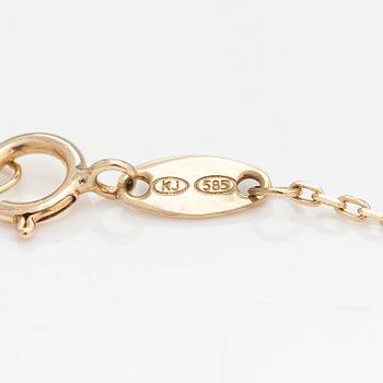 A 14K gold bracelet with a topaz. Kultajousi, Helsinki.