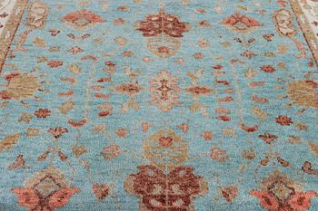 An oriental carpet with Mamluk-design, c. 303 x 239 cm.