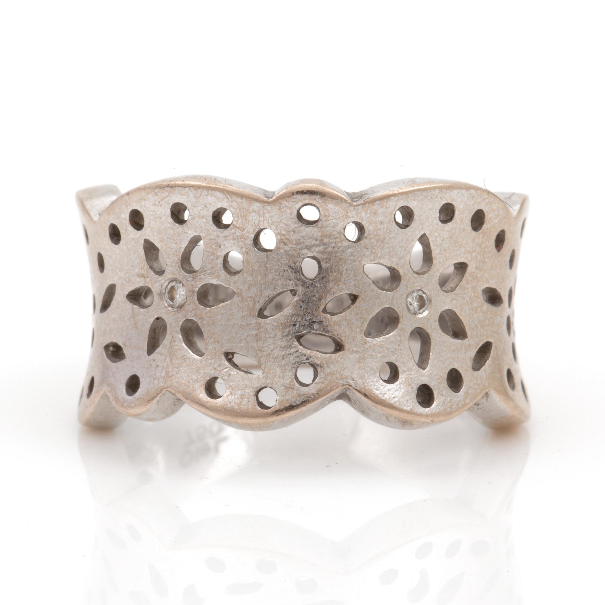 A Charlotte Lynggaard for Ole Lynggaard Lace ring with 4 brilliant cut diamonds total 0.04 ct. Bukowskis