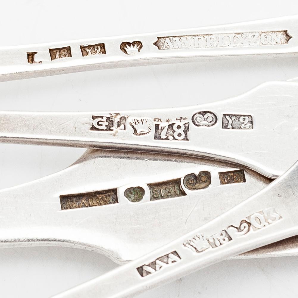 A 10-piece set of silver dessert spoons from Porvoo and Lovisa, mostly from the 1850s, and a jam spoon, 1926, Porvoo.