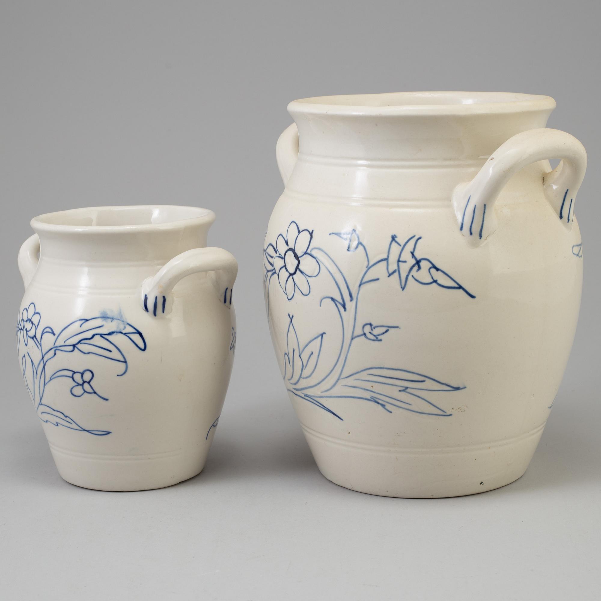 A set of four 20th century blue and white jars by Rörstrand.