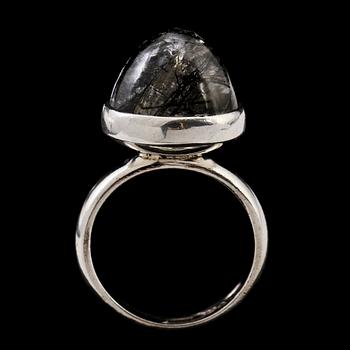 RINGAR, 3 st, silver med cabochonslipade stenar, 1900-talets senare hälft. Vikt 20 g.