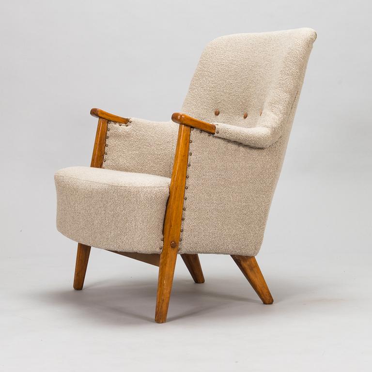 Olof Ottelin, a 1950's 'Pompadour' armchair for Oy Stockmann Ab, Keravan puusepäntehdas.