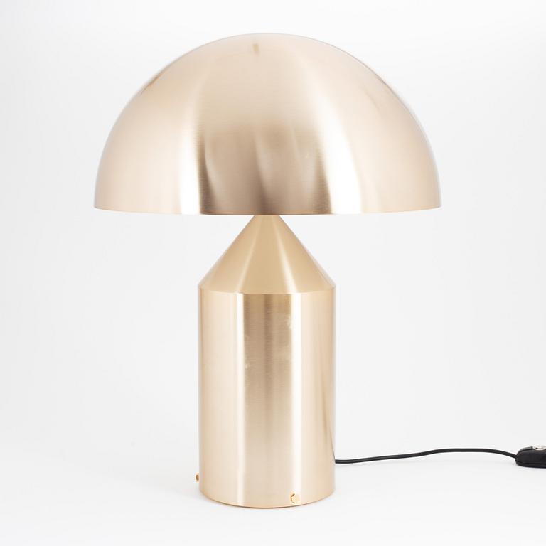 An 'Atollo - gold' table lamp by Vico Magistretti for Oluce, designed before 1977.