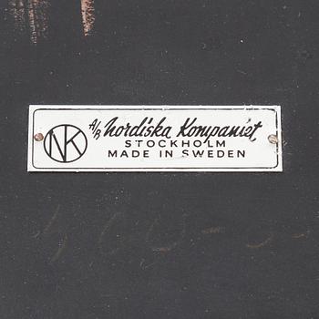 Bengt Ruda, fåtölj samt fotpall, ur "Triva"-kollektionen för Nordiska Kompaniets Verkstäder Nyköping, 1950-tal.