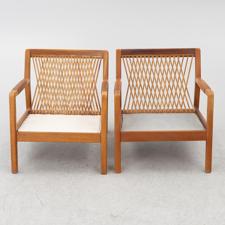 Carl Gustaf Hiort af Ornäs, a matched pair of 'Rialto' lounge chairs, Puunveisto Oy - Träsnideri Ab, Finland, mid-20th century.
