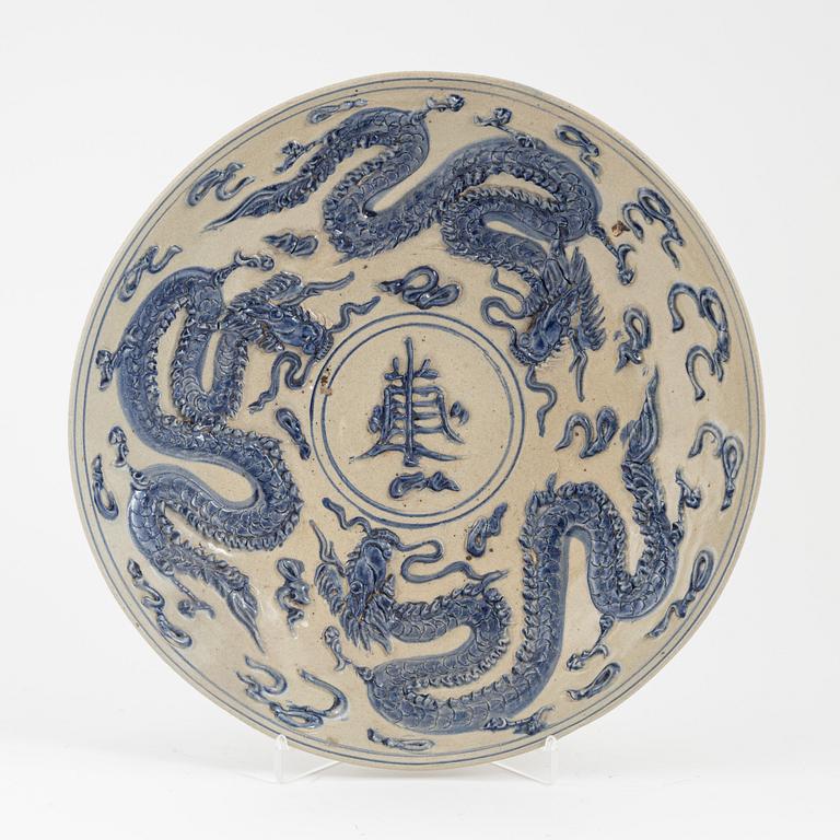 A ceramic dragon dish, Sout East Asia, 20th century.