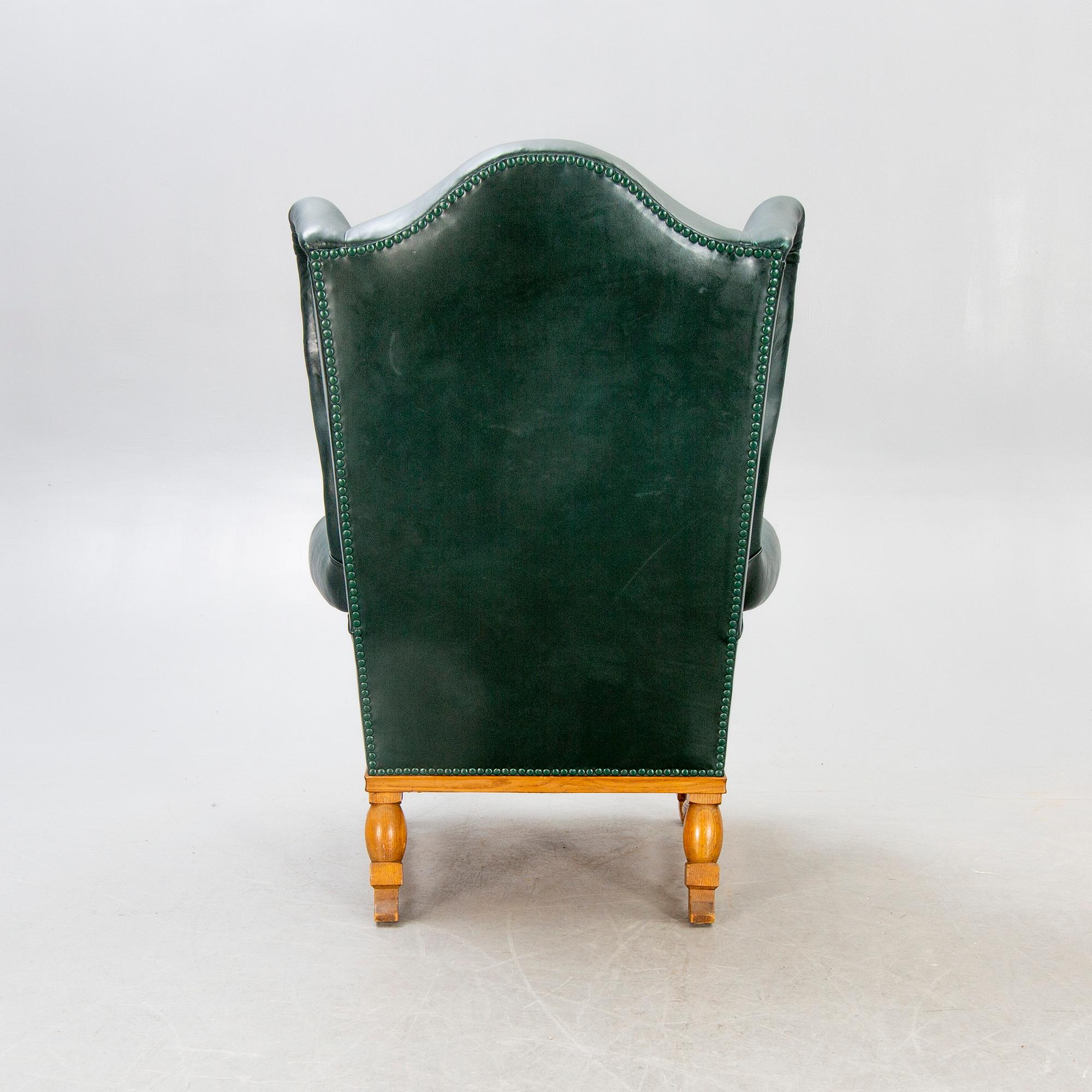 A  mid 1900s leather armchair.