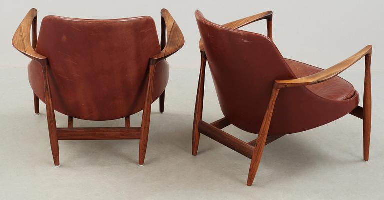 A pair of Ib Kofod Larsen palisander and brown leather 'Elisabeth' easy chairs, Christensen & Larsen, Denmark 1950-60's.