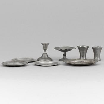 A lot of eight pewter doll house accessories 19th century.