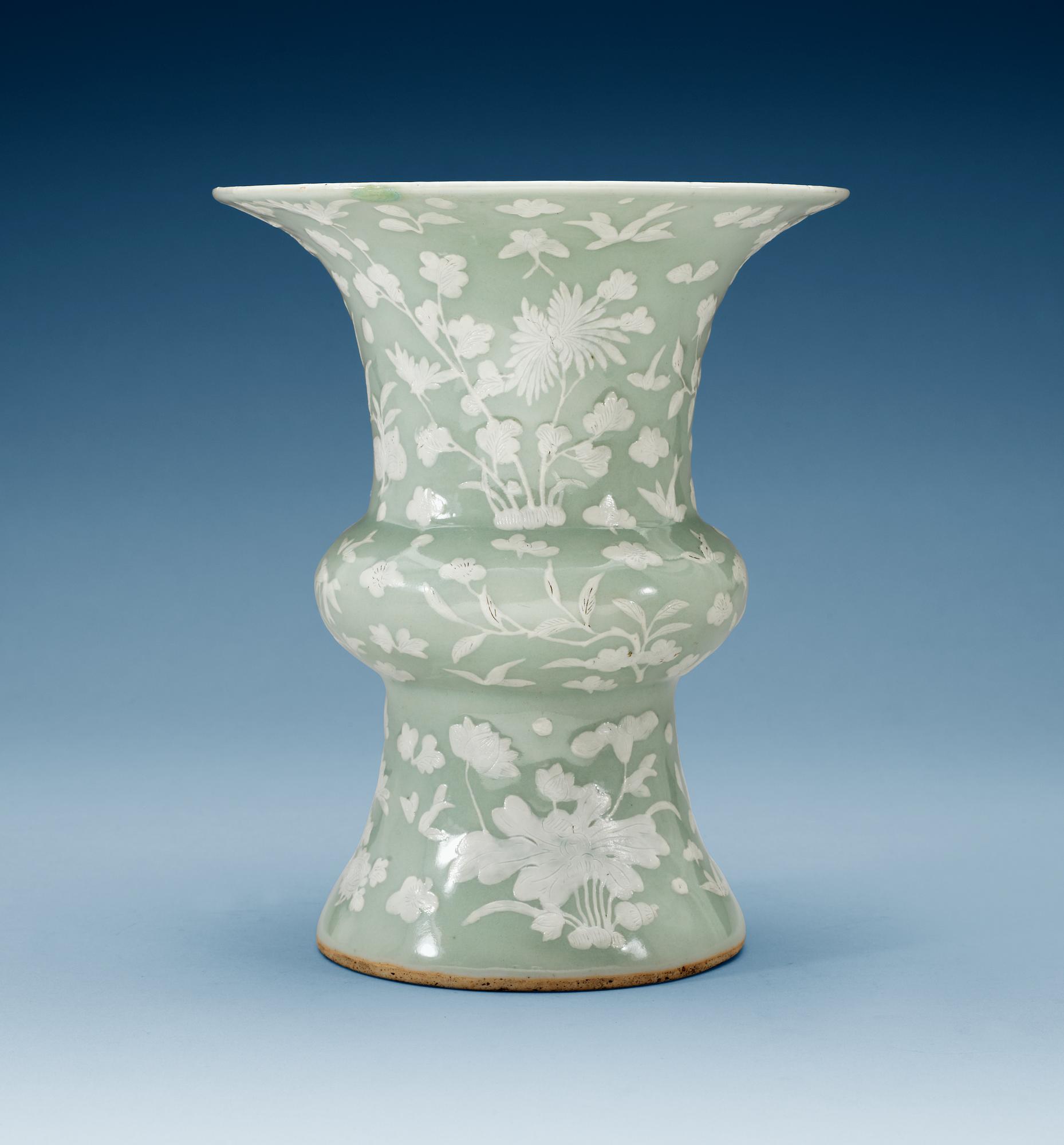 A celadon slip decorated vase, Qing dynasty, Kangxi (1662-1722).