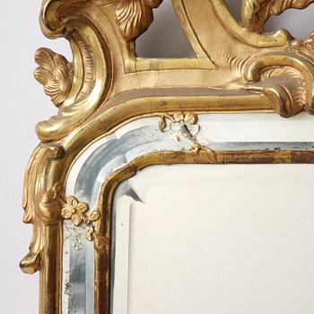 A rococo giltwood mirror, Stockholm, later part 18th century.