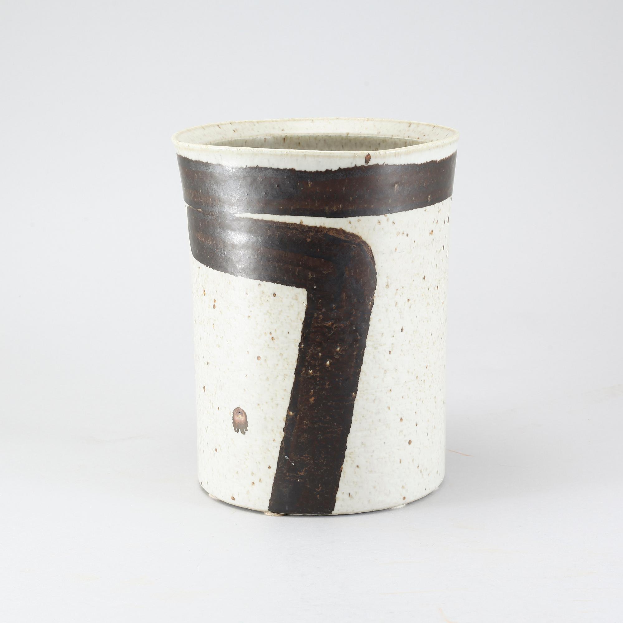 A stoneware flower pot by Inger Persson for Rörstrand Ateljé.