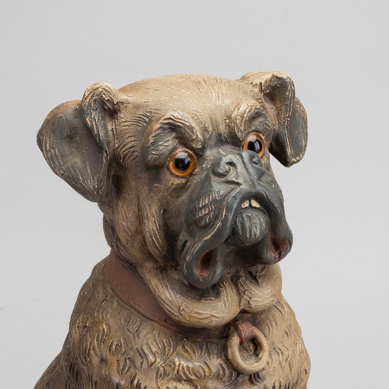 A 20th CENTURY TERRACOTTA DOG.