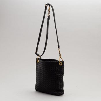 Bottega Veneta, a black intrecciato handbag.