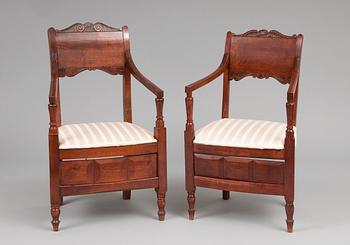 55A. A PAIR OF ARMCHAIRS.