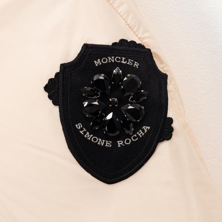 Moncler, a down cape 'Shari Giubbotto'.