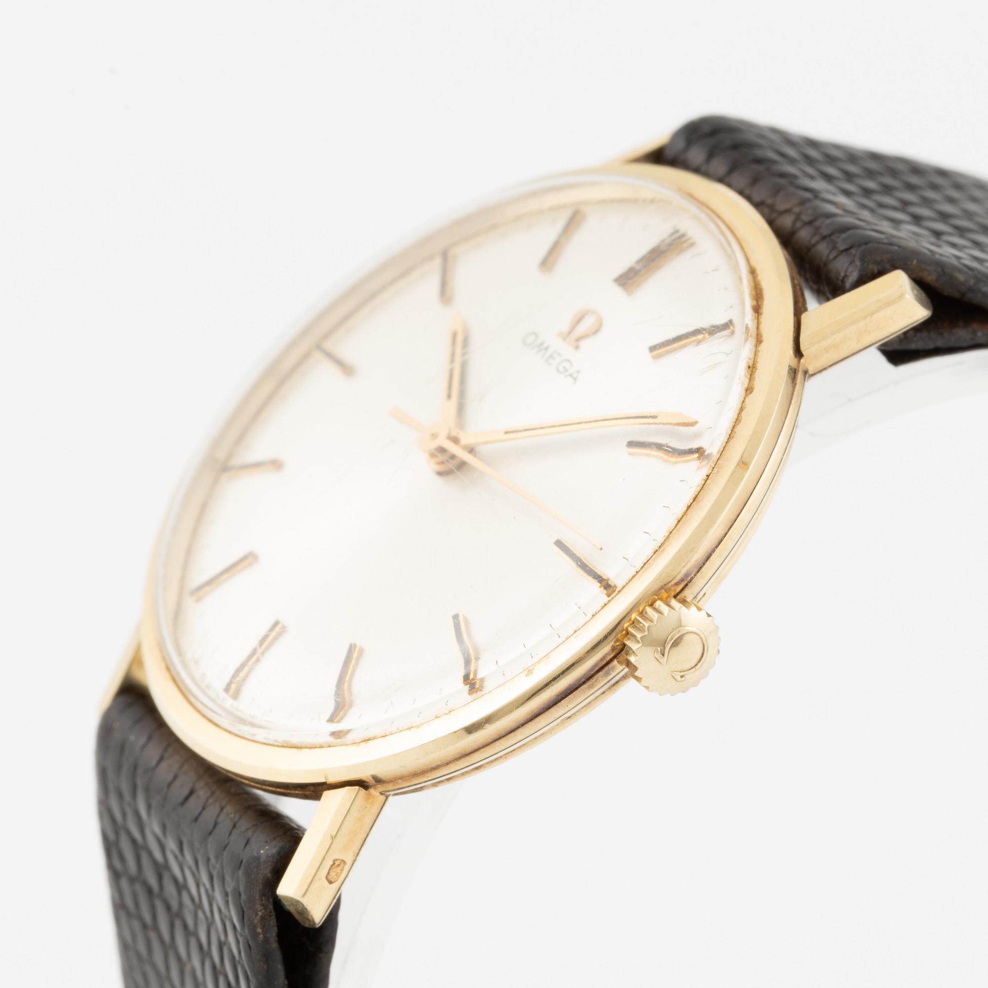 Omega, wristwatch, 14K gold, 33 mm.