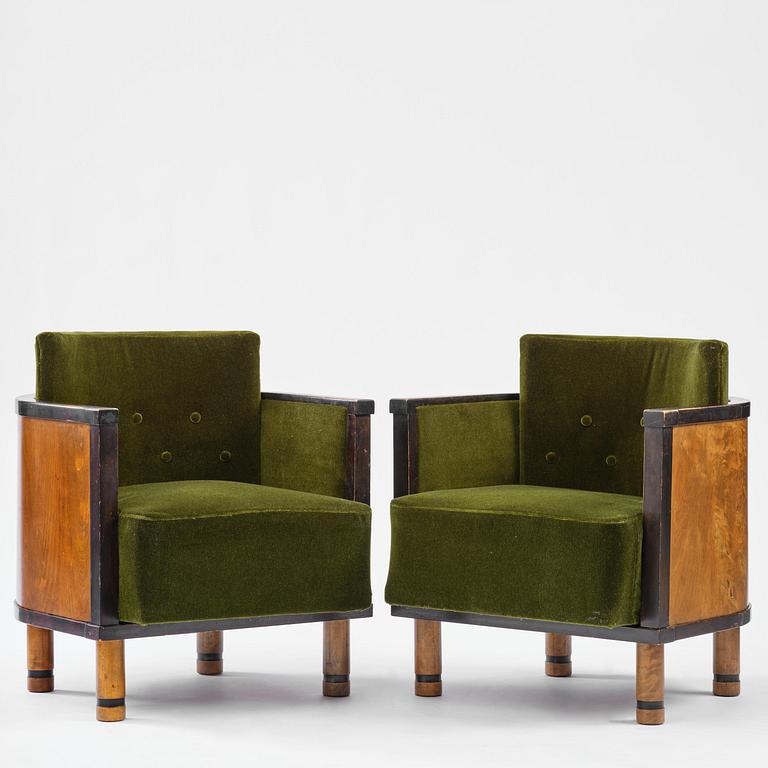 A pair of 1930s birch armchairs.