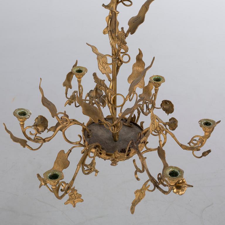 An app. 1900 french brass/metal chandelier.