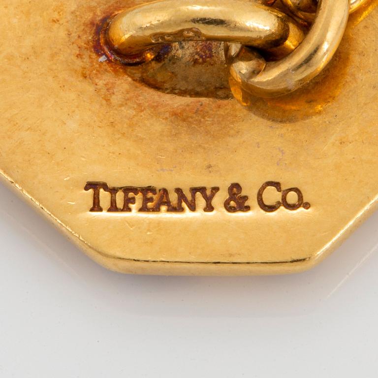 A pair of Tiffany cufflinks in 18K gold with enamel decoration.