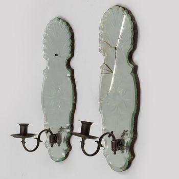 A pair of Baroque mirror wall sconces, 18th Century.