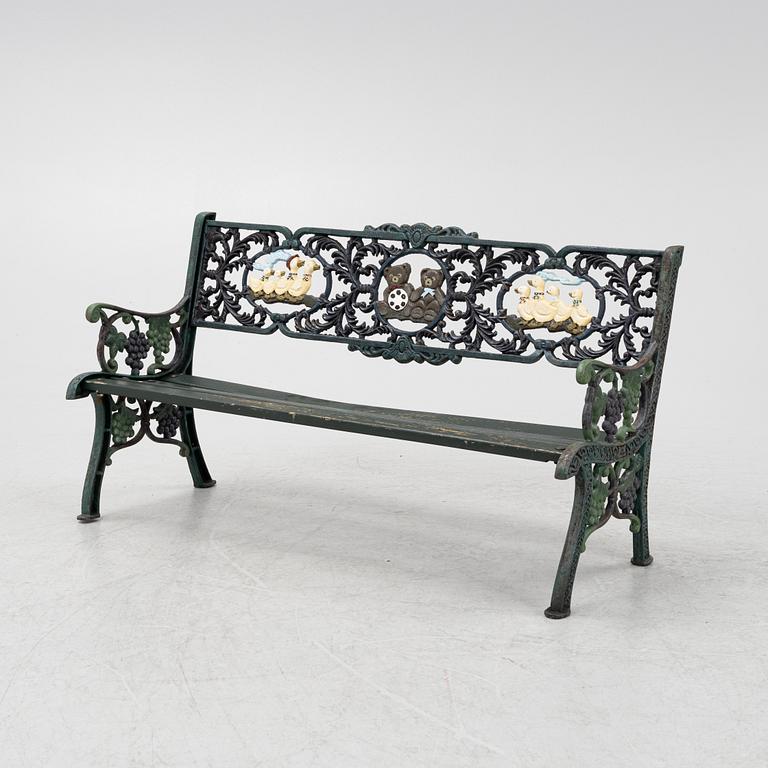 A children's cast iron garden sofa and armchair, mid 20th century.