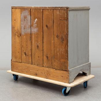 A mid 19th century painted chest of drawers.