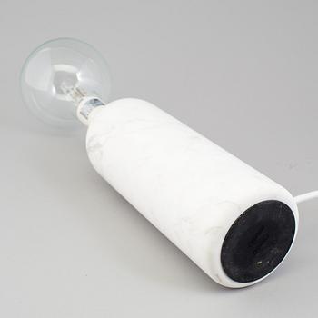 a "Kizu" table lamp by Lars Tornoe for New works.