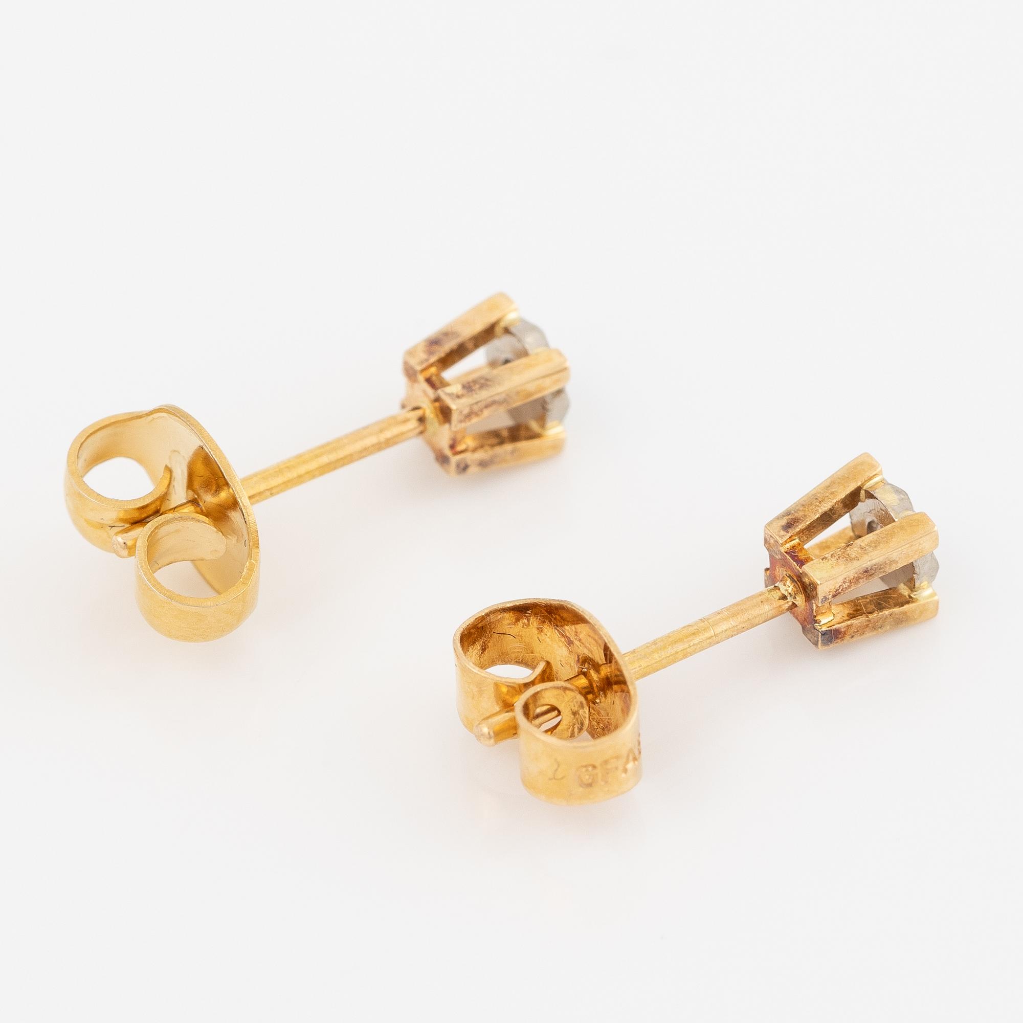 Earrings, 18K gold with small octagon-cut diamonds.