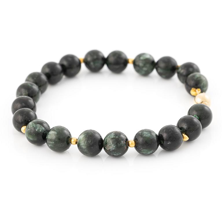 Bracelet, with dark green stones, clasp in 18K gold.