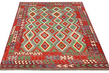 A carpet, Kilim c. 298 x 202 cm.