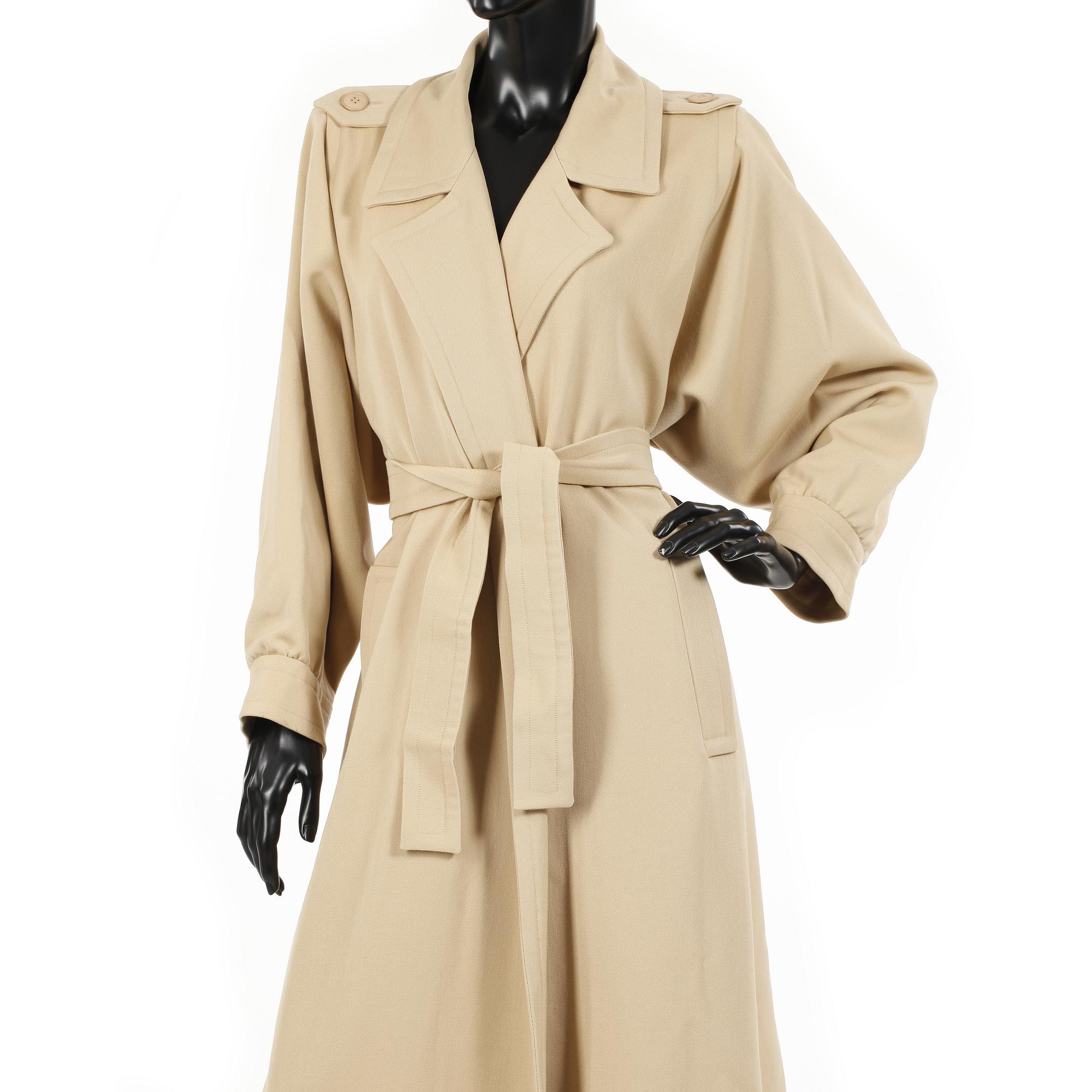 YVES SAINT LAURENT, a beige wool coat.
