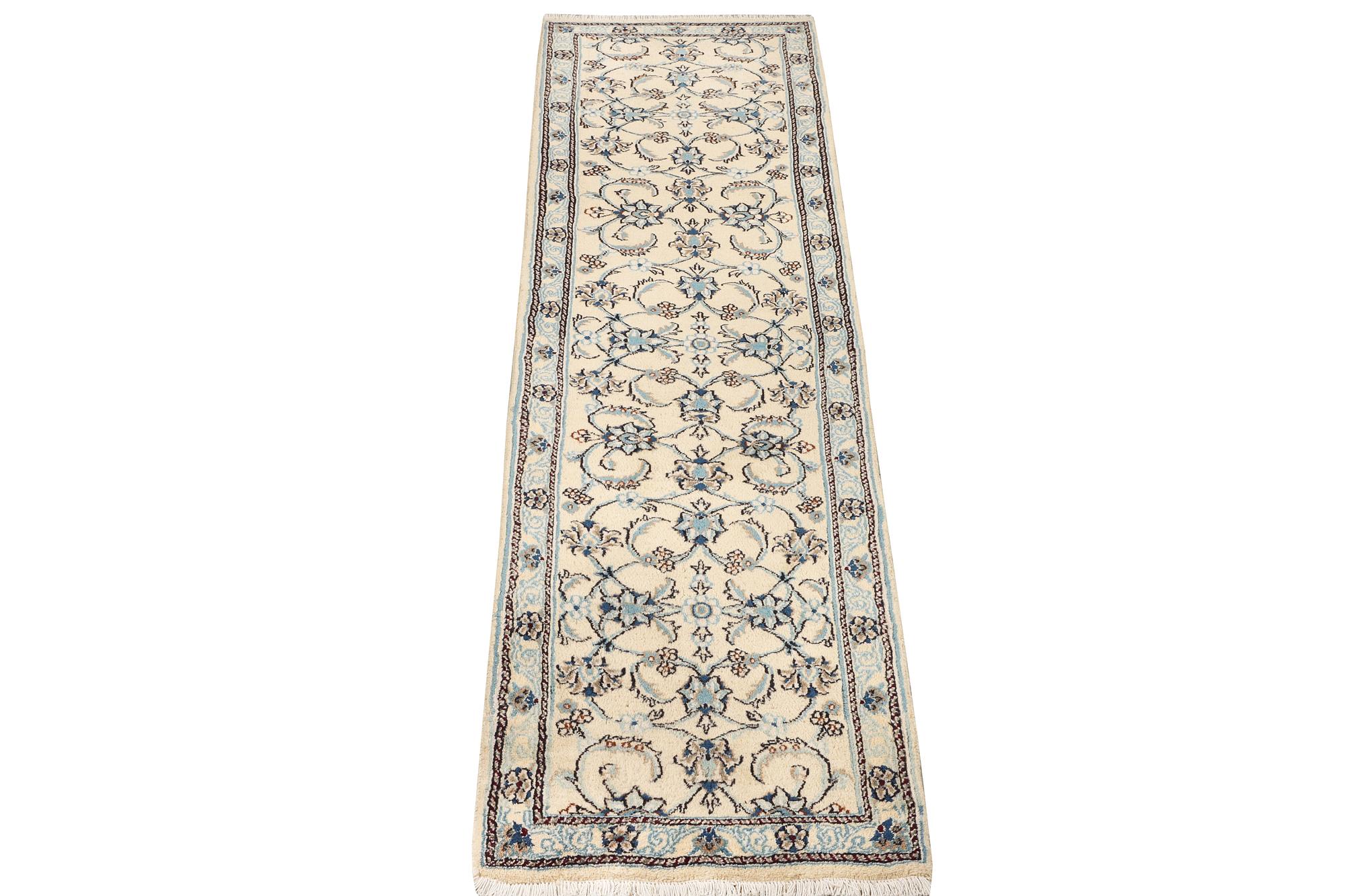A Nain runner, part silk, c. 288 x 64 cm.