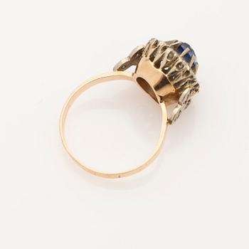 Ring, 18k gold with diamonds and sapphire.