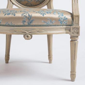 A pair of carved Gustavian chairs by J. Mansnerus (master 1756-1779).