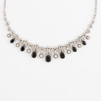 Necklace 18K white gold with step-cut sapphires and round and eight-cut diamonds.
