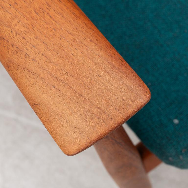 Finn Juhl, a model 138 armchair, France & Søn, Denmark, 1960s.