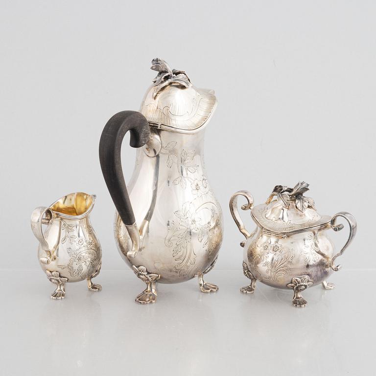 A Swedish Silver Coffee Pot, Creamer and Sugar Bowl, mark of W.A. Bolin, Stockholm 1956-62.