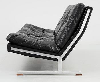 A Nørreklit black leather sofa on chromed steel base by Selectform, Denmark 1960's.