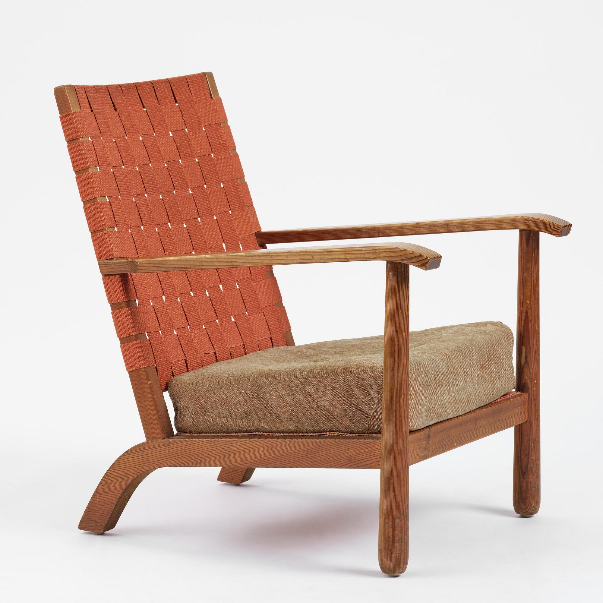 Axel Einar Hjorth, a stained pine "Väddö" easy chair, Nordiska Kompaniet, Sweden, 1930s-40s.