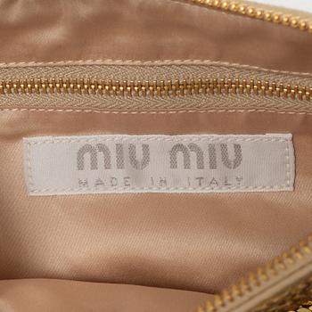Miu Miu, a handbag.