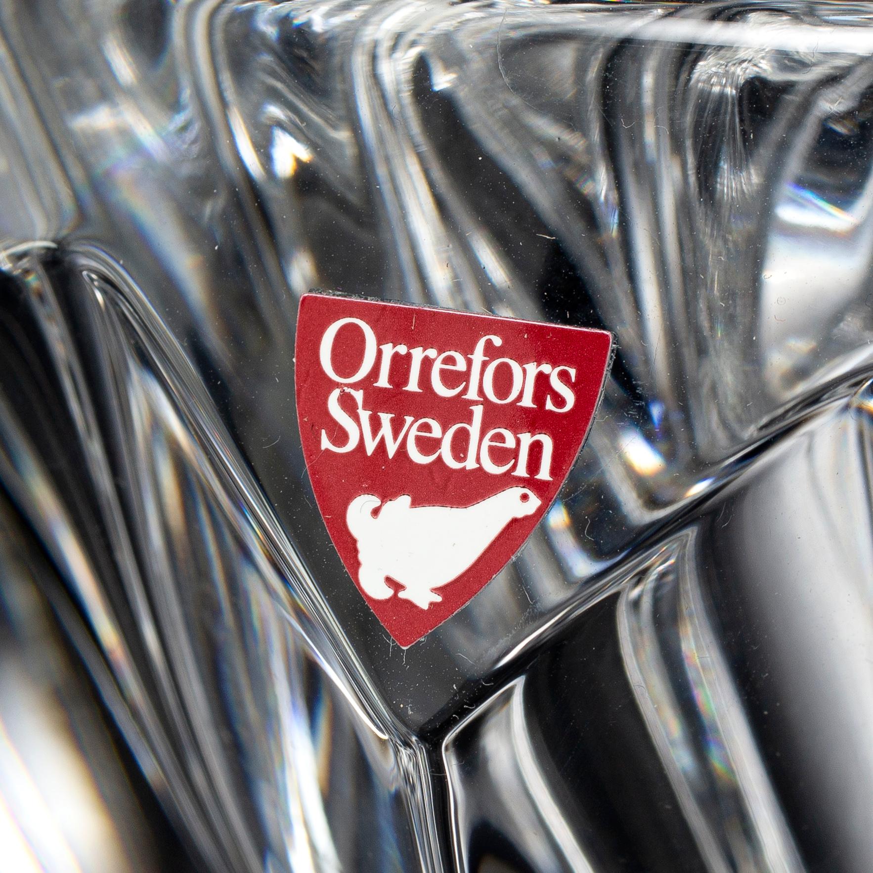 ERIKA LAGERBIELKE, a glass 'Zodiak' vase and two bowls from Orrefors.