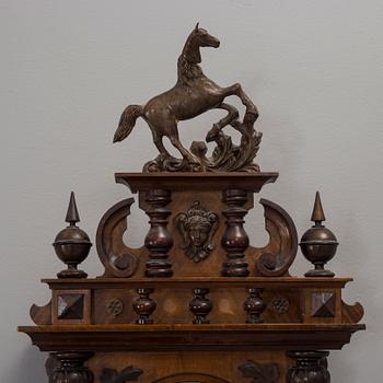 A circa 1900 Renaissance style wall clock.