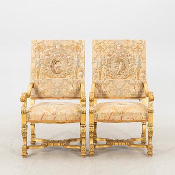 A pair of gilded Baroque style armchairs first half of the 20th century.