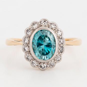 Blue zircon and diamond cluster ring.