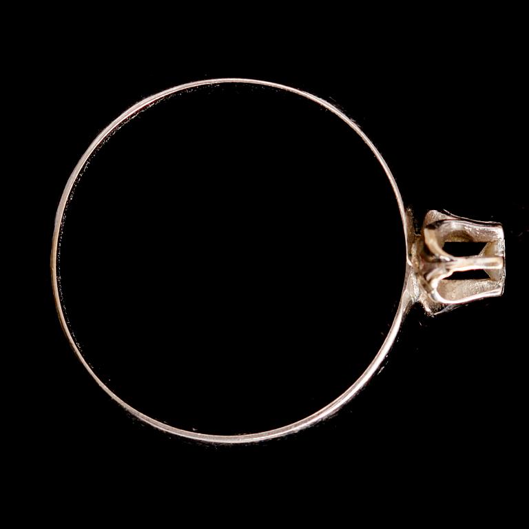 RING, 18 k vitguld, mindre solitär briljantslipad diamant .