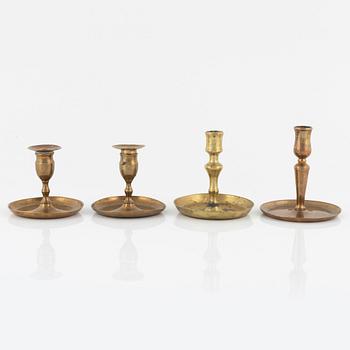 Four bronze candlesticks, a pair of which Skultuna model N 60, 18th-19th Century.