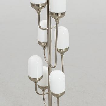 A FLOOR LAMP.