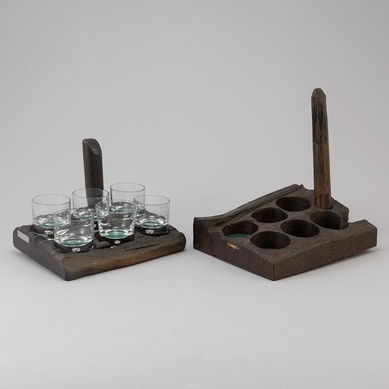 two whiskey stand made by wood from the Riksvasa ship with 6 glasses by Kosta in the 20th century.